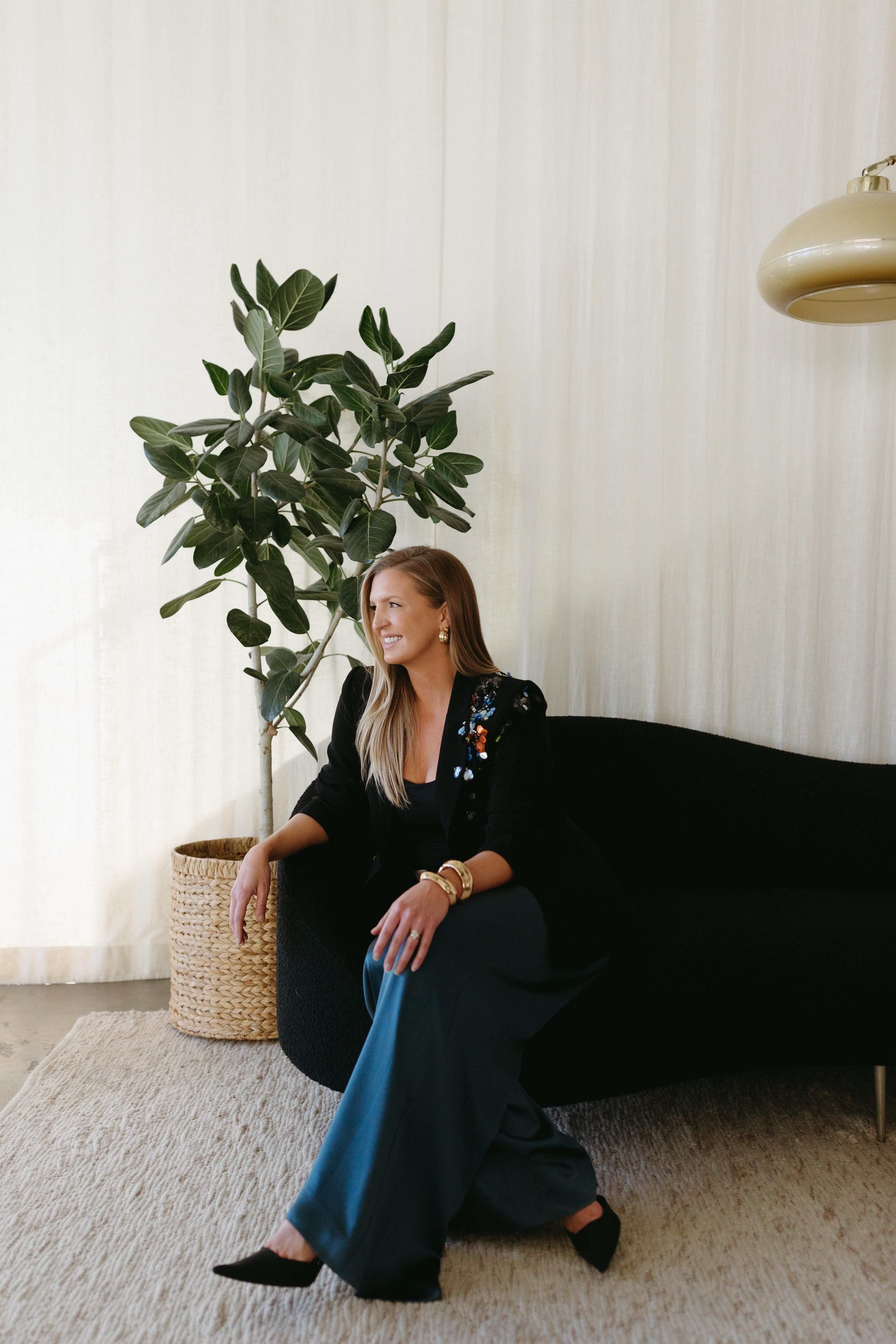 image of Kati Kasch sitting on a couch